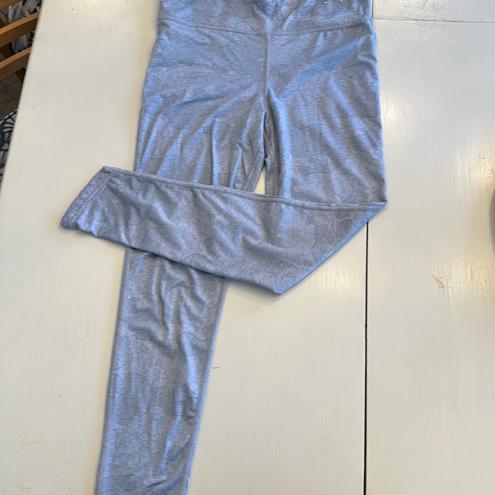 Large 14 leggings. A person who is a medium could also fit into them!